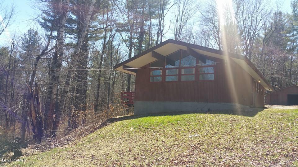 1785 East Windsor Road Windsor, MA 01270 - Photo 3 of 24 a front view of a house with a yard