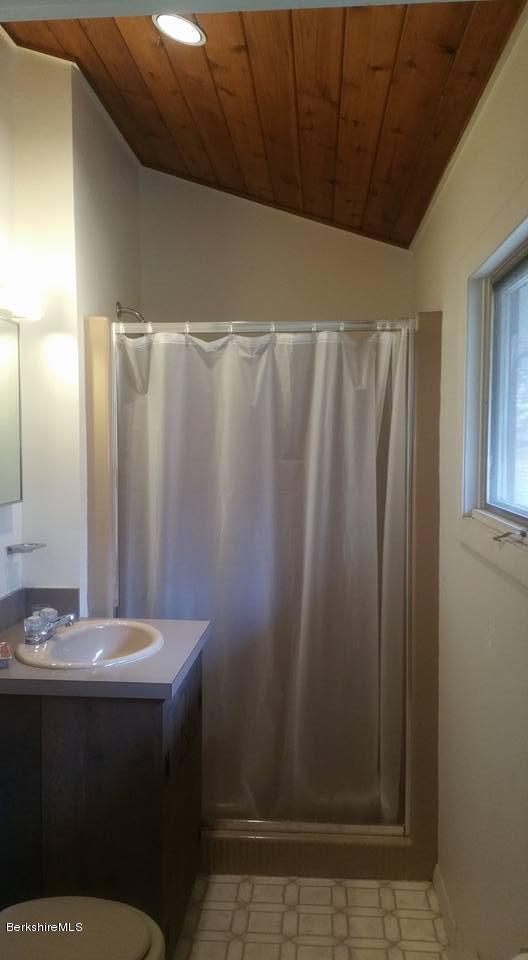 1785 East Windsor Road Windsor, MA 01270 - Photo 21 of 24 a bathroom with a sink and mirror