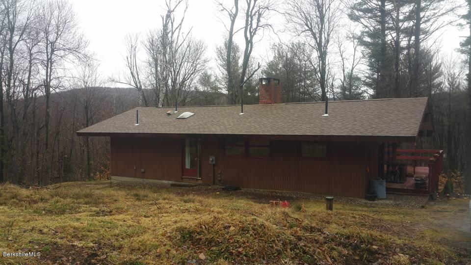 1785 East Windsor Road Windsor, MA 01270 - Photo 4 of 24 a front view of a house with a yard