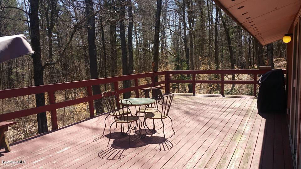 1785 East Windsor Road Windsor, MA 01270 - Photo 5 of 24 a view of balcony with wooden floor and outdoor seating