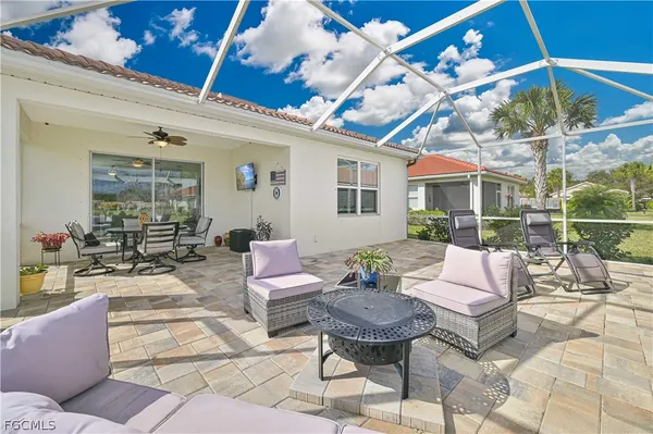a outdoor space with patio couches and a potted plant