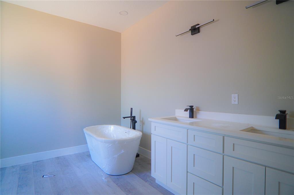 8413 Southwest 131st Lane Ocala, FL 34473 - Photo 13 of 28 a bathroom with a toilet sink and mirror
