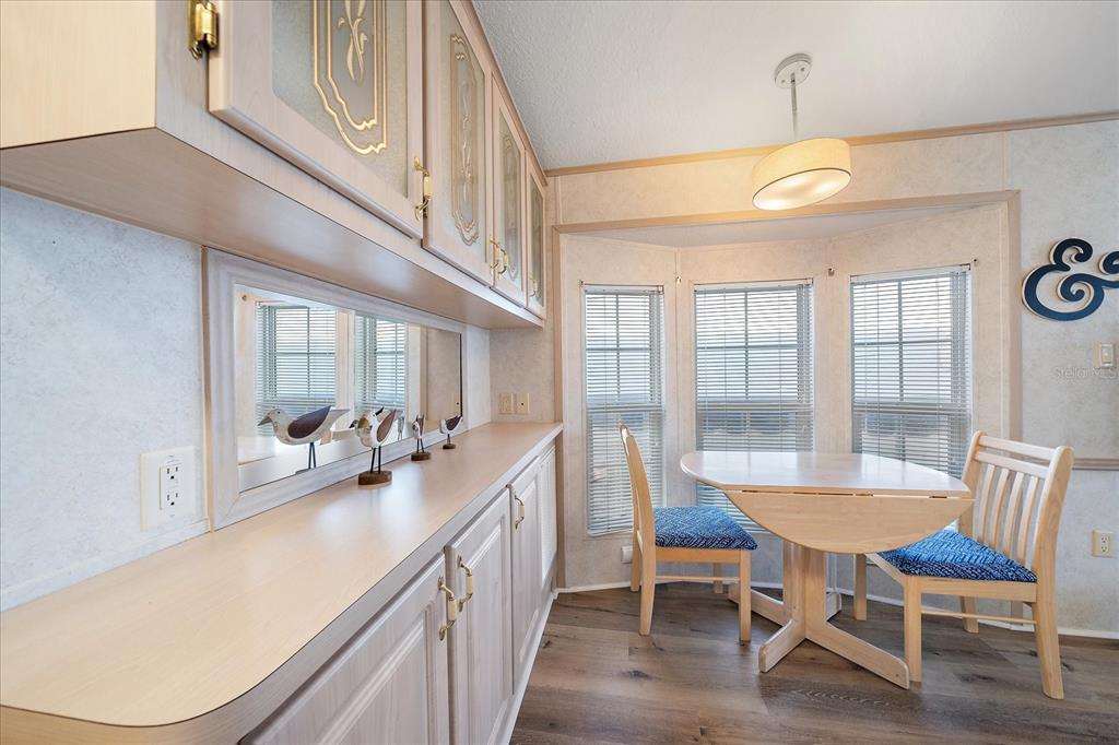 14 Basin Street Palmetto, FL 34221 - Photo 15 of 27 a view of a dining room with furniture and a large window