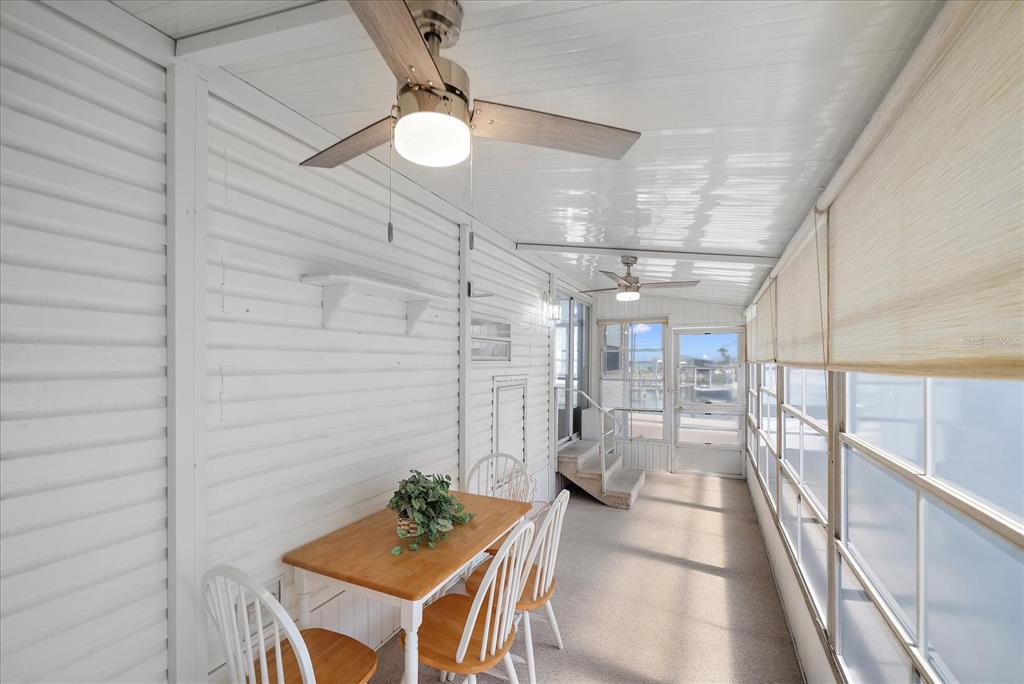 14 Basin Street Palmetto, FL 34221 - Photo 24 of 27 a view of a living room and chandelier