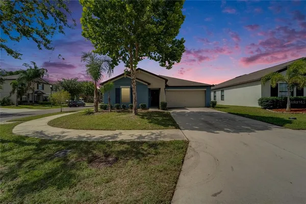 a view of a house with a big yard