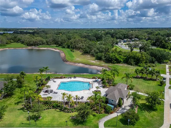 an aerial view of a house with a garden