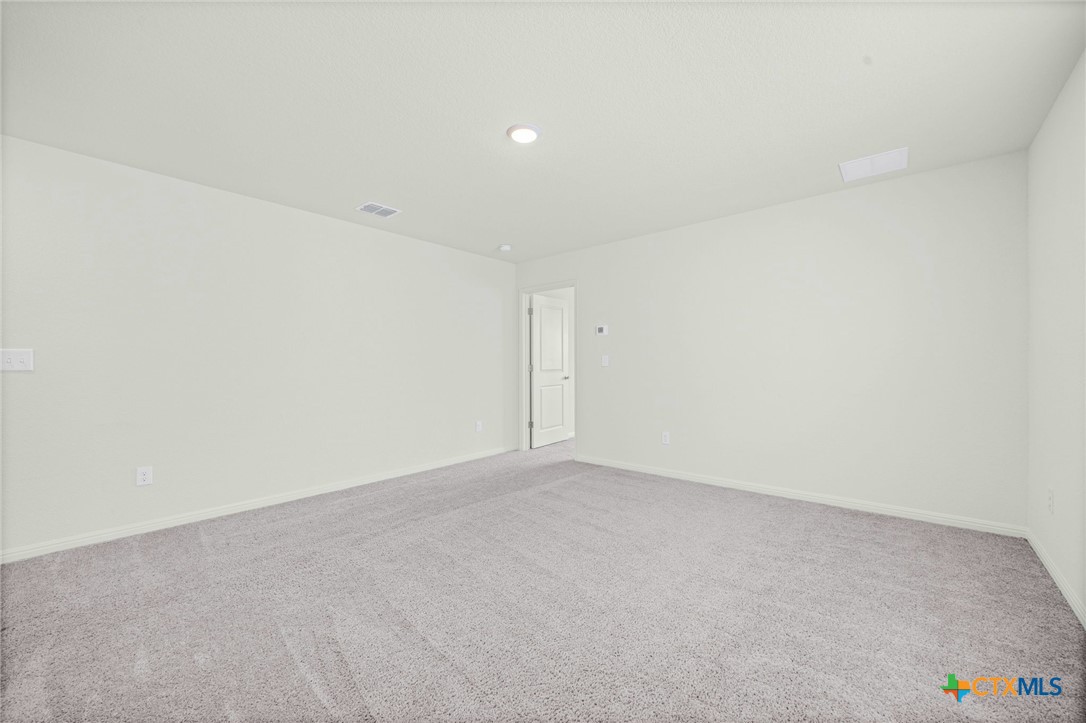 231 Enforcer Loop Jarrell, TX 76537 - Photo 20 of 41 Loft/Living space upstairs