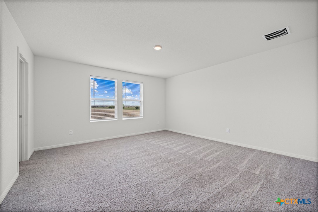231 Enforcer Loop Jarrell, TX 76537 - Photo 22 of 41 Primary Suite