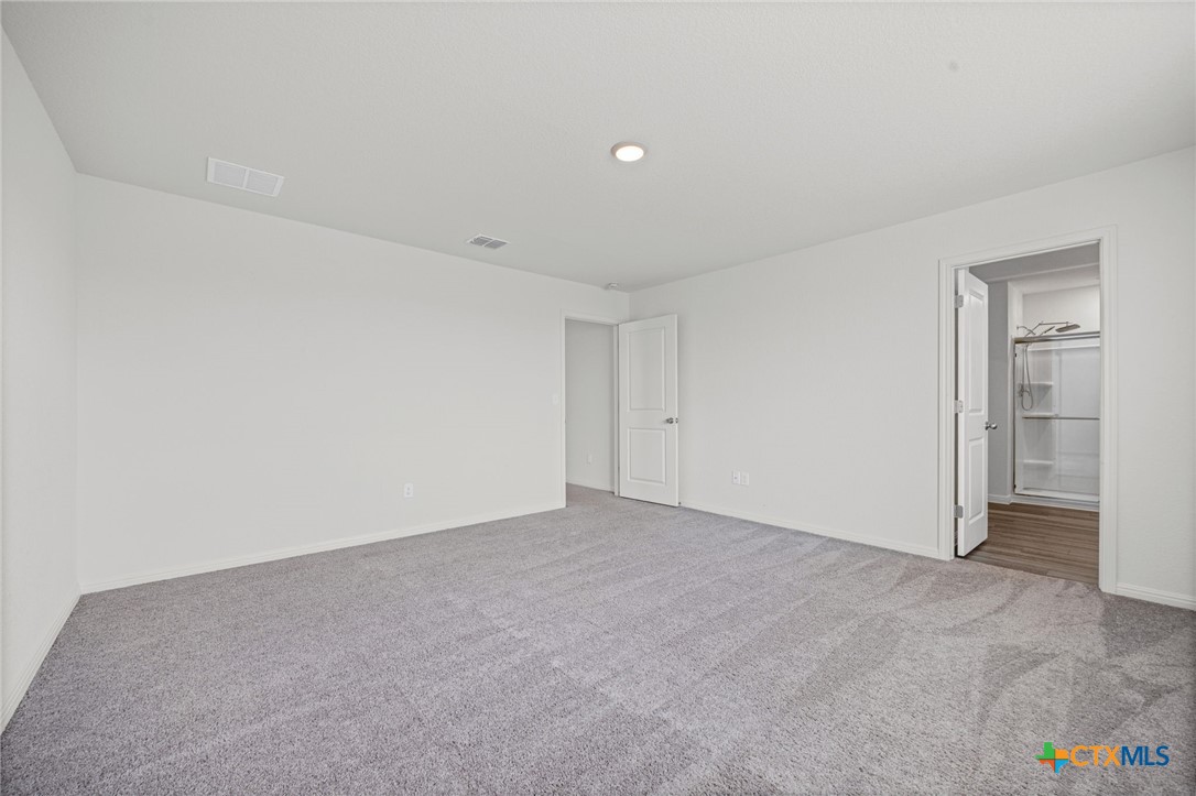 231 Enforcer Loop Jarrell, TX 76537 - Photo 23 of 41 Primary Suite