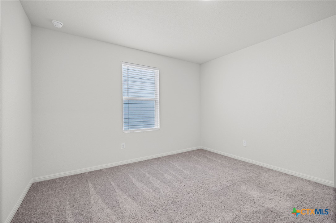 231 Enforcer Loop Jarrell, TX 76537 - Photo 33 of 41 Bedroom upstairs