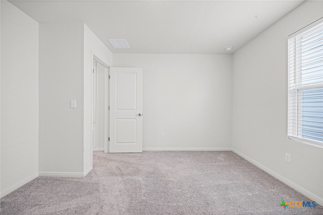 231 Enforcer Loop Jarrell, TX 76537 - Photo 35 of 41 Bedroom upstairs