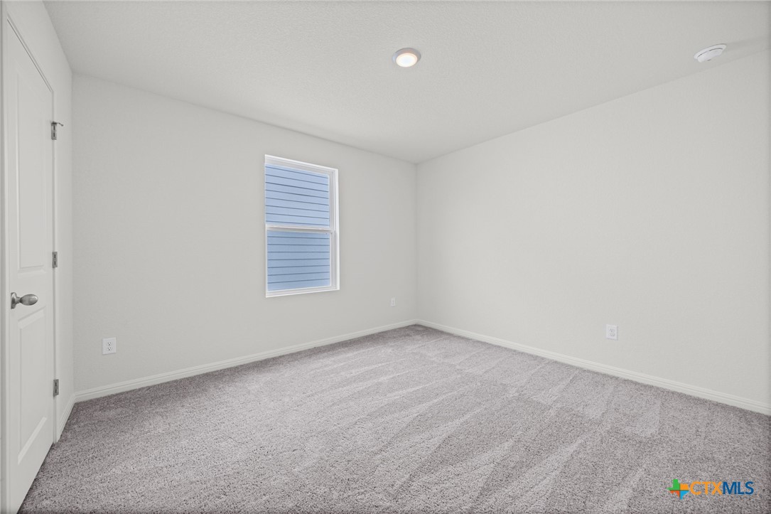 231 Enforcer Loop Jarrell, TX 76537 - Photo 37 of 41 Bedroom upstairs