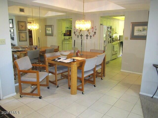 4303 East Cactus Road, Unit 130 Phoenix, AZ 85032 - Photo 3 of 17 10 130 LIGHT AND BRIGHT DINING AREA