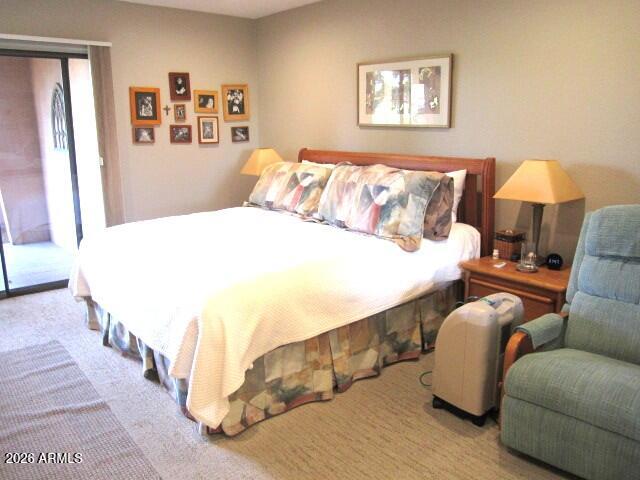 4303 East Cactus Road, Unit 130 Phoenix, AZ 85032 - Photo 5 of 17 10 130 PRIMARY WITH PATIO ACCESS