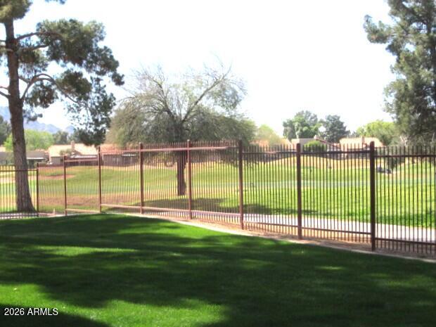 4303 East Cactus Road, Unit 130 Phoenix, AZ 85032 - Photo 7 of 17 10 130 PATIO VIEW