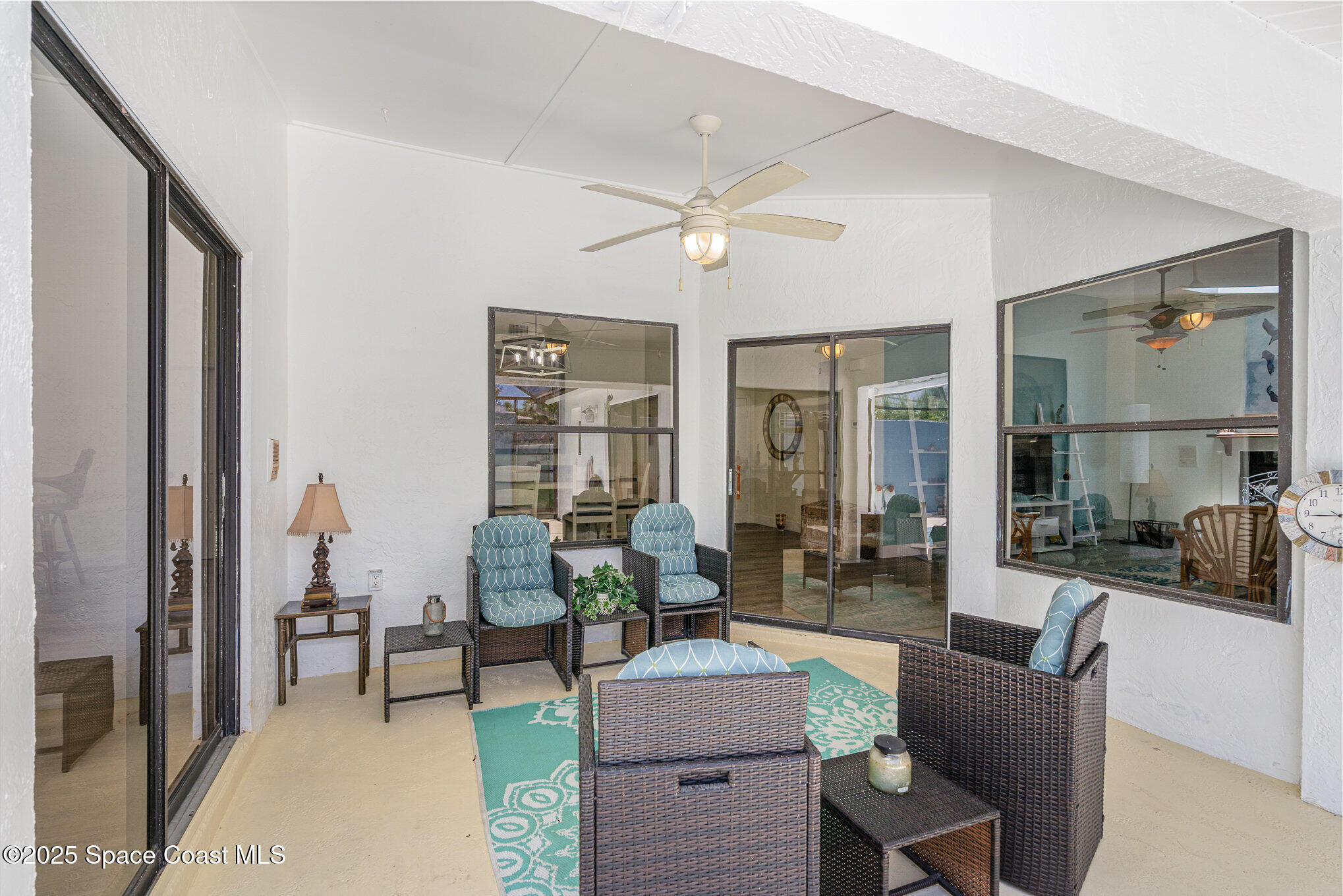 313 Pine Ridge Lane Melbourne, FL 32940 - Photo 21 of 28 a living room with furniture and wooden floor