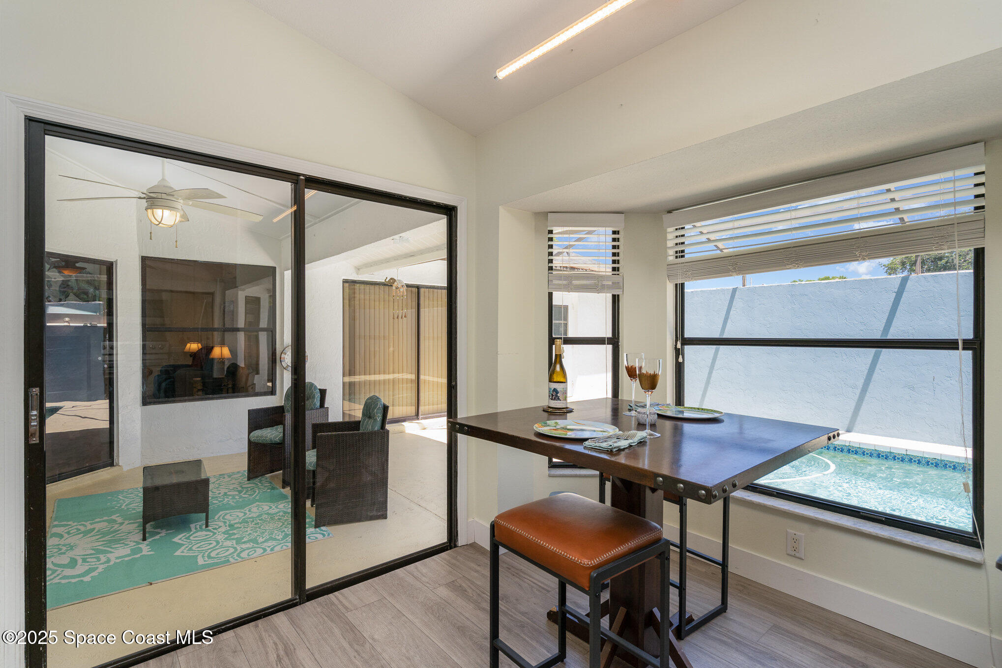 313 Pine Ridge Lane Melbourne, FL 32940 - Photo 22 of 28 a workspace with furniture and window