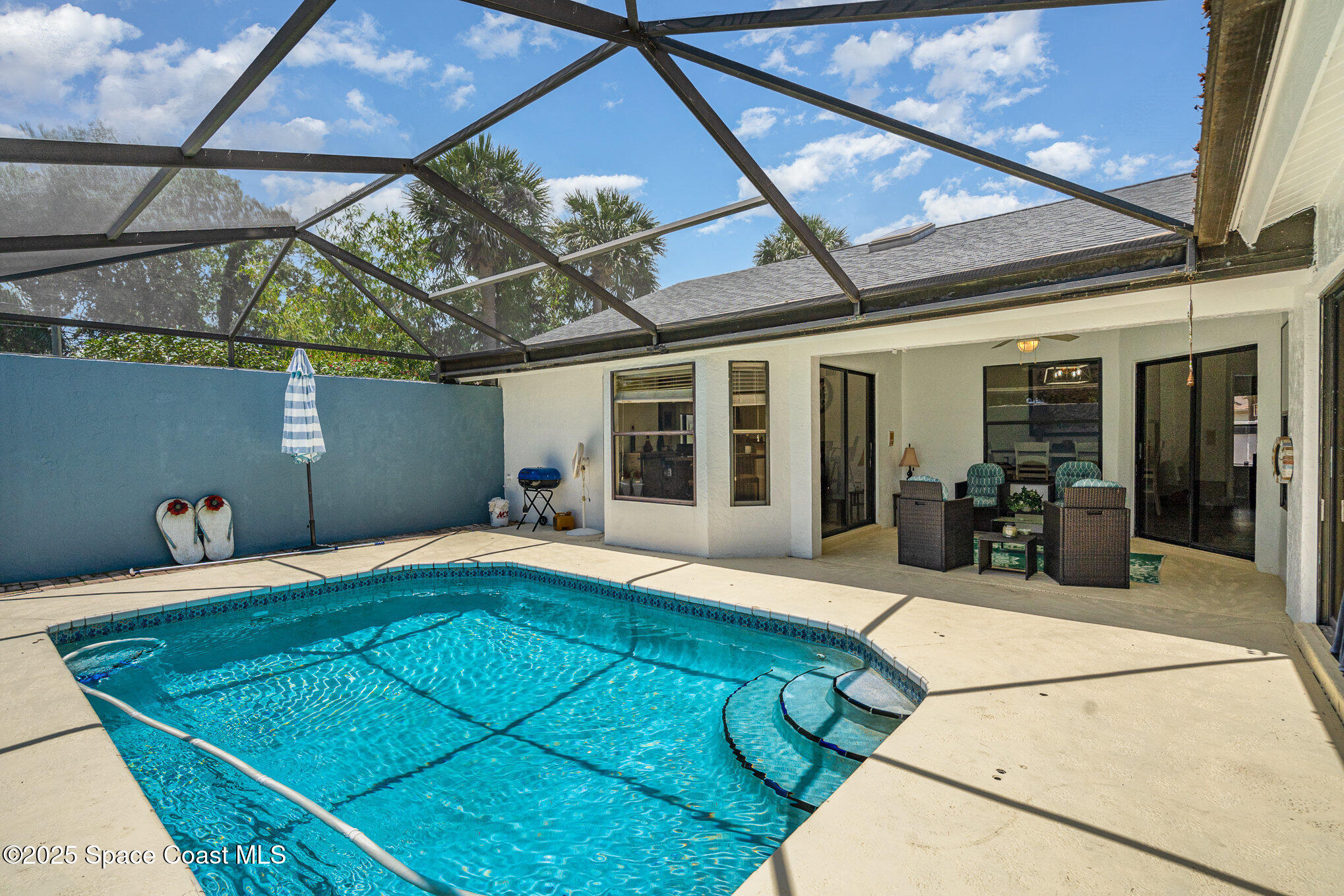 313 Pine Ridge Lane Melbourne, FL 32940 - Photo 24 of 28 a room with pool table and chairs