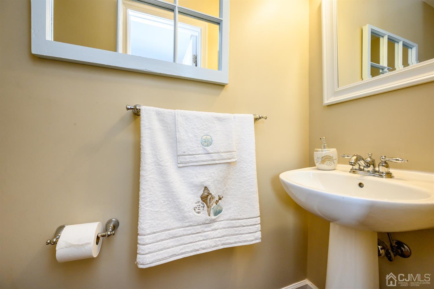 65 Lamp Post Drive Barnegat, NJ 08005 - Photo 14 of 36 a bathroom with a sink and a mirror