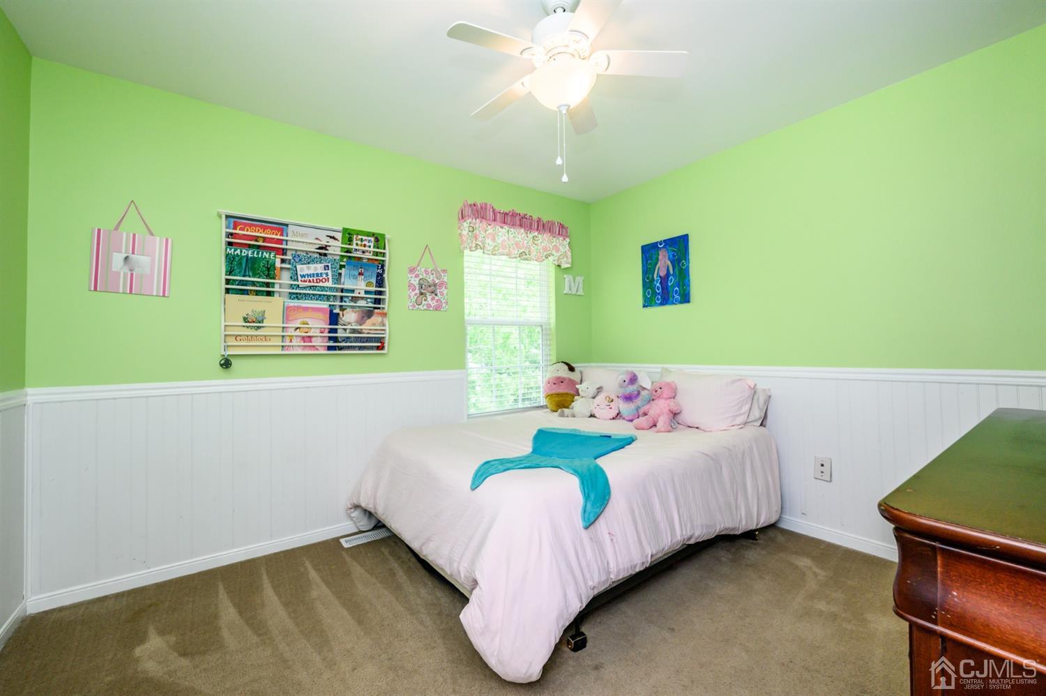 65 Lamp Post Drive Barnegat, NJ 08005 - Photo 15 of 36 a bedroom with a bed and a table