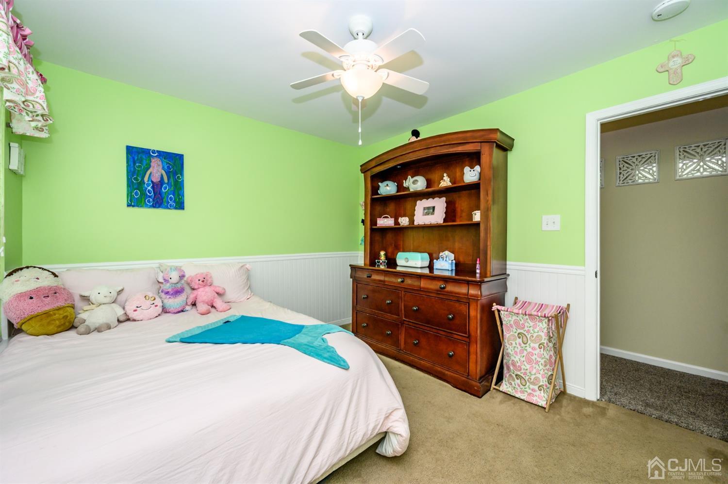 65 Lamp Post Drive Barnegat, NJ 08005 - Photo 16 of 36 a bedroom with a bed and a cabinets