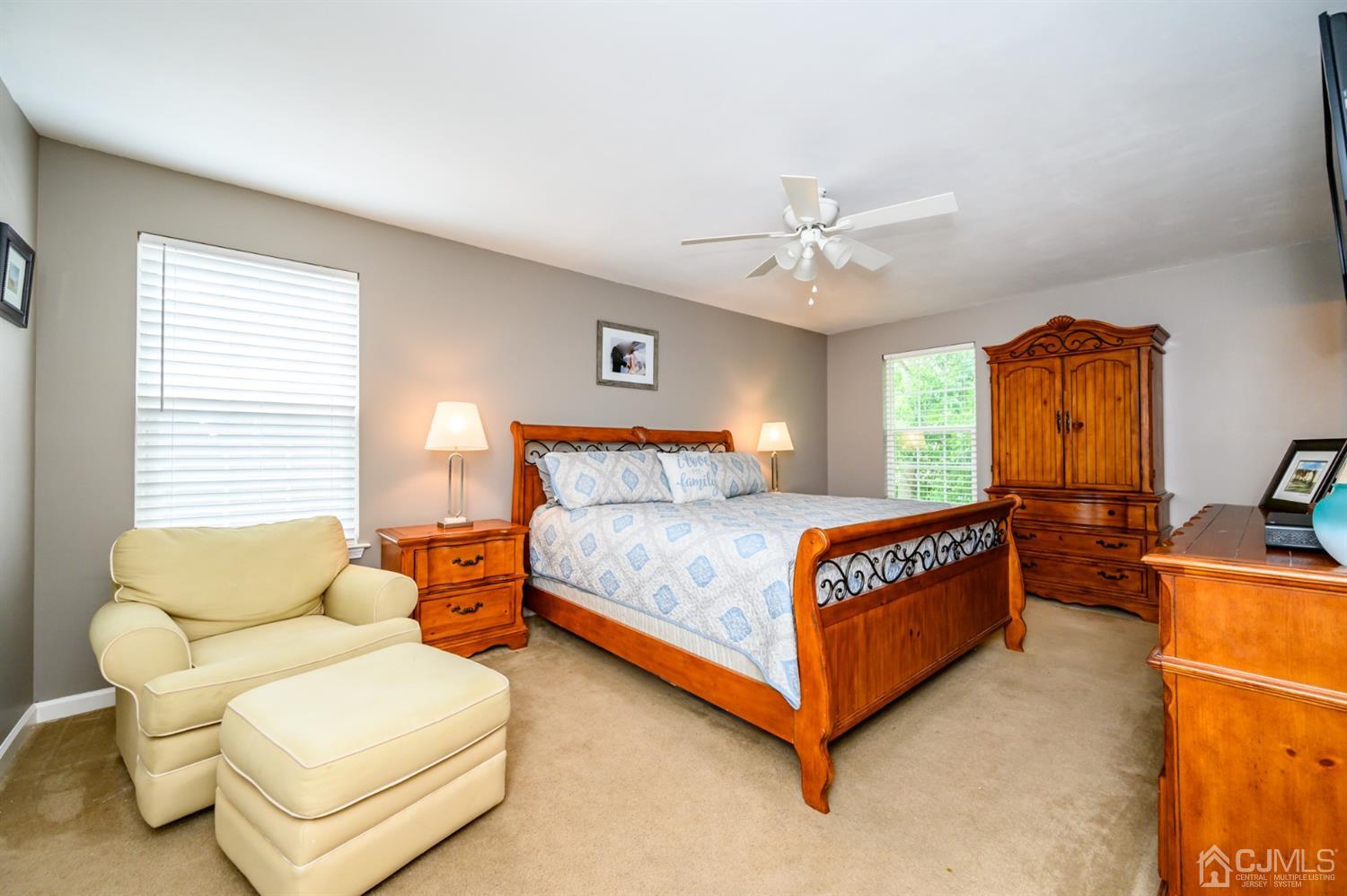 65 Lamp Post Drive Barnegat, NJ 08005 - Photo 22 of 36 a bedroom with a bed and a couch