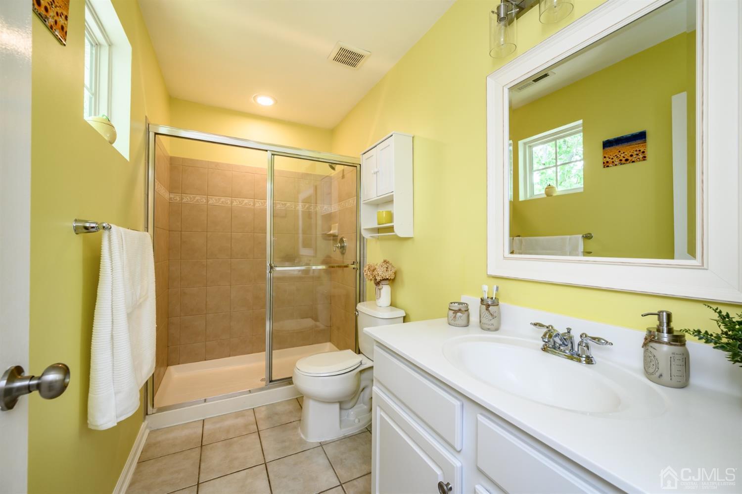 65 Lamp Post Drive Barnegat, NJ 08005 - Photo 25 of 36 a bathroom with a sink a toilet and shower