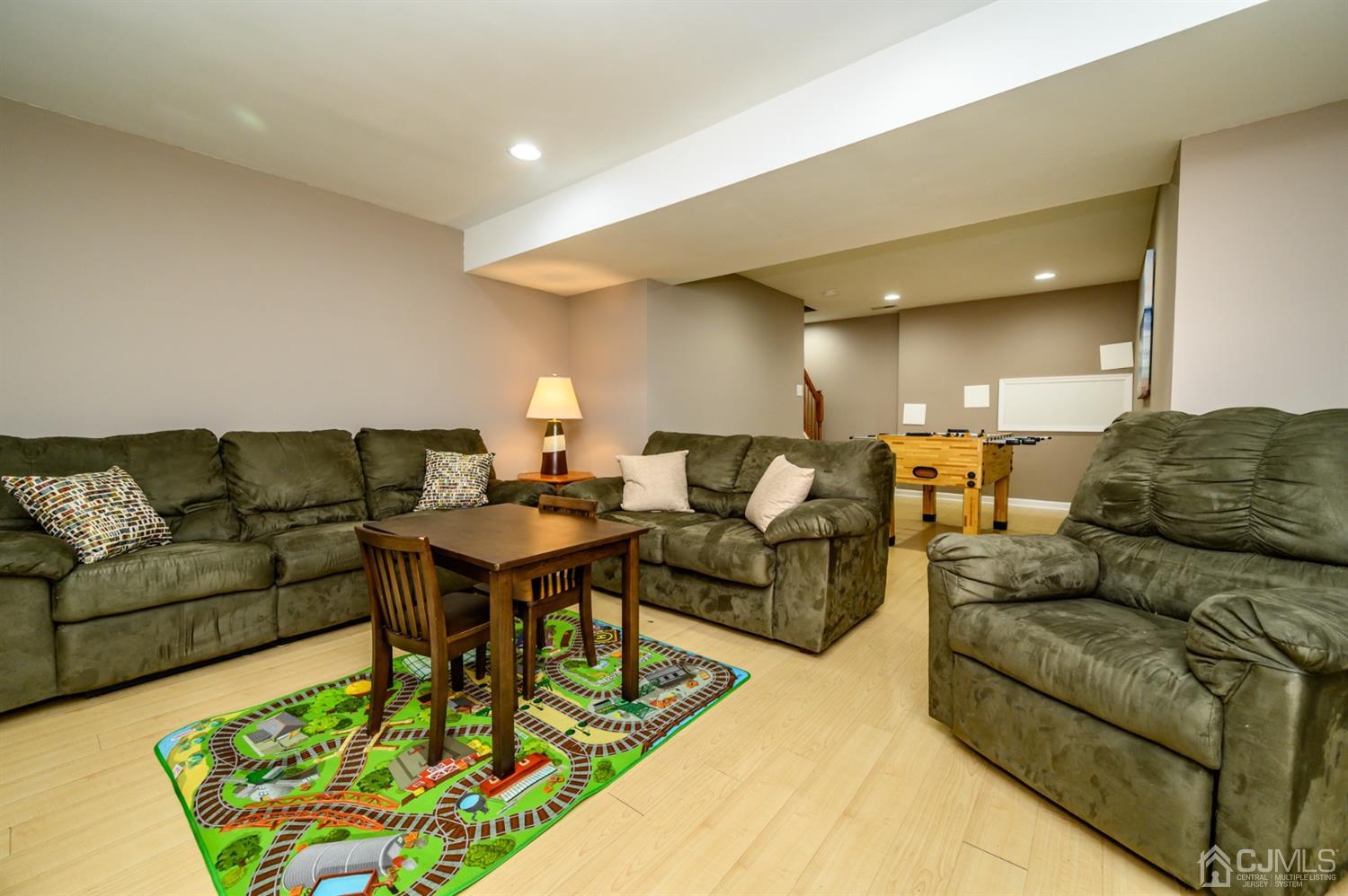 65 Lamp Post Drive Barnegat, NJ 08005 - Photo 29 of 36 a living room with furniture and a couch