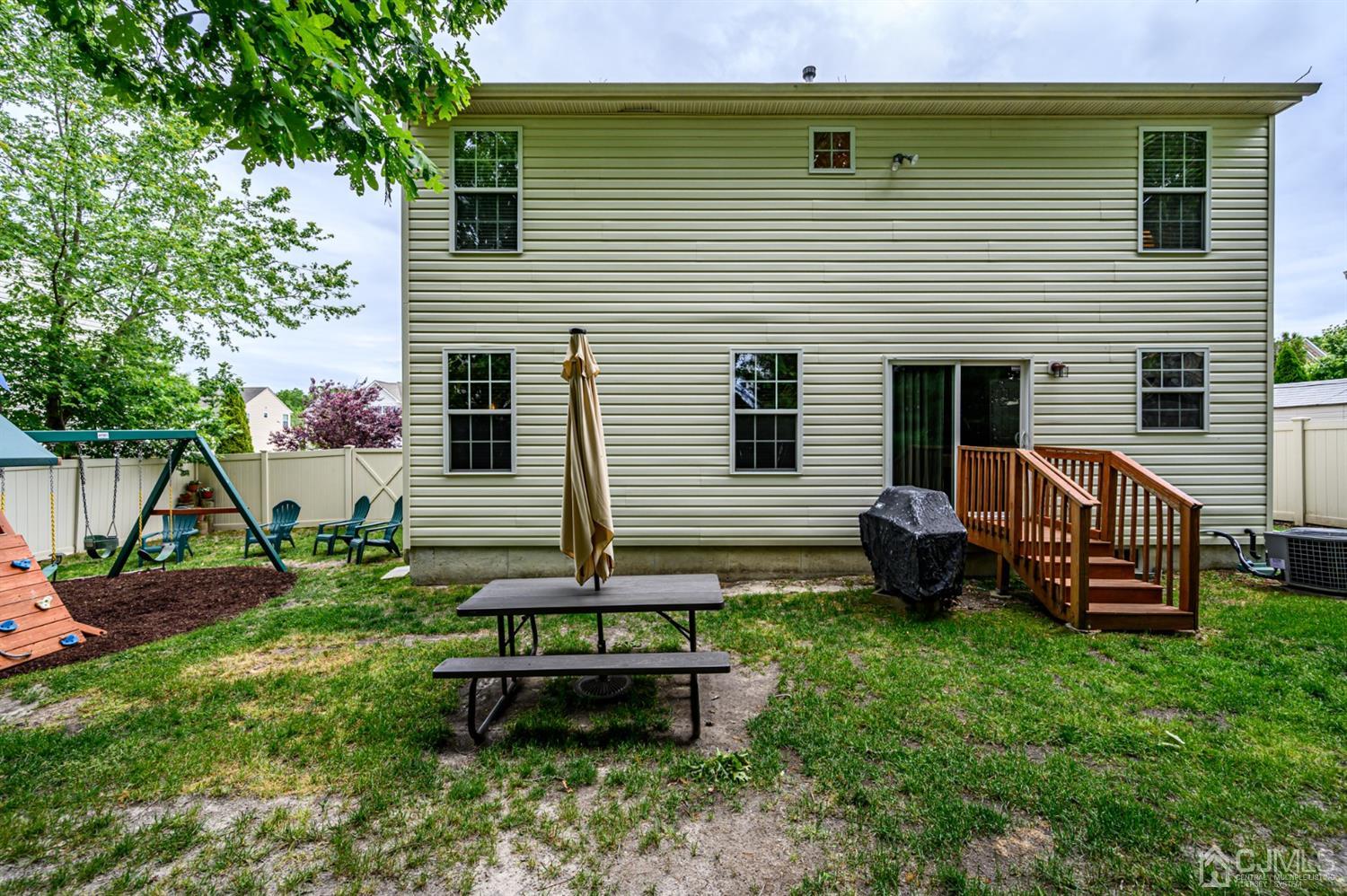 65 Lamp Post Drive Barnegat, NJ 08005 - Photo 36 of 36 a front view of a house with garden