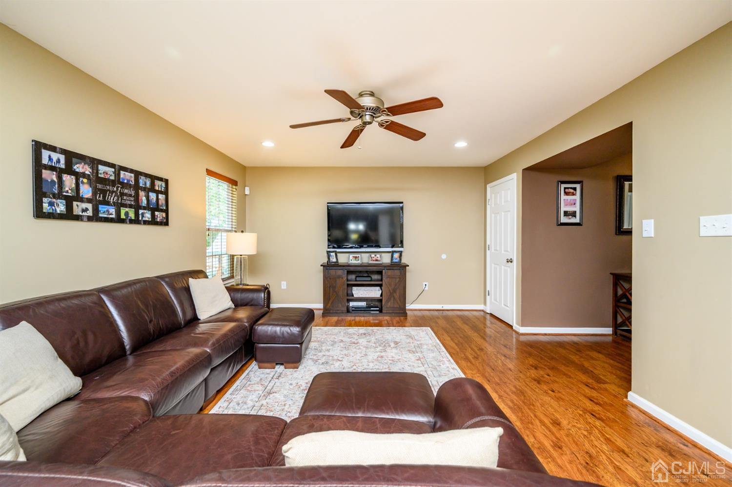 65 Lamp Post Drive Barnegat, NJ 08005 - Photo 7 of 36 a living room with furniture and a flat screen tv