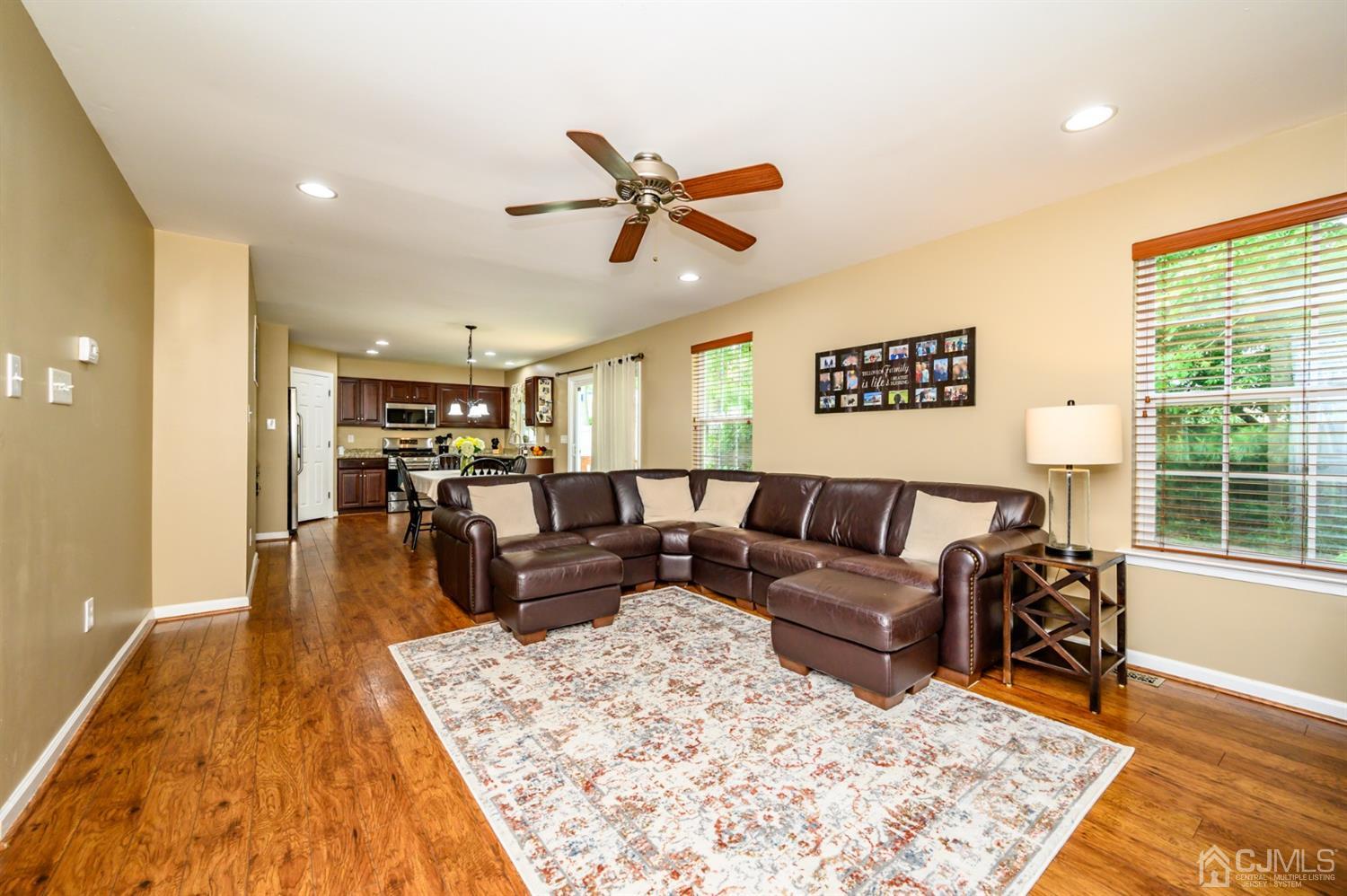 65 Lamp Post Drive Barnegat, NJ 08005 - Photo 8 of 36 a living room with furniture and wooden floor
