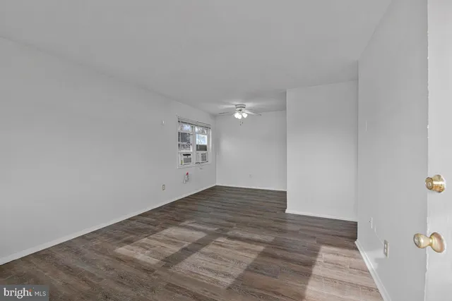 a view of an empty room and window