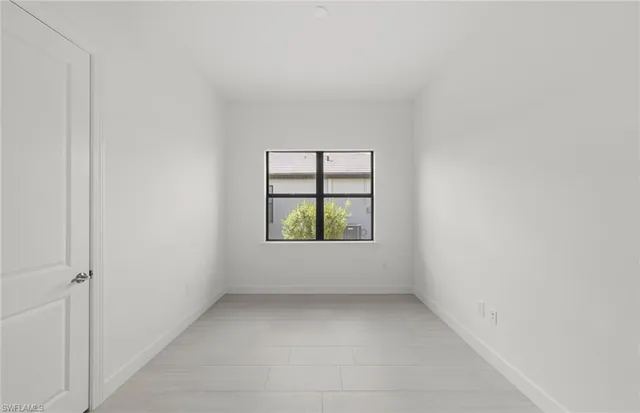 an empty room with a window