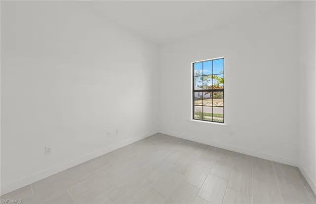 an empty room with a window