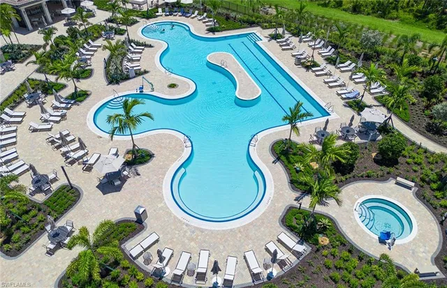 an aerial view of a swimming pool and outdoor space