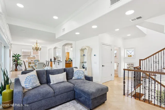 a kitchen with stainless steel appliances granite countertop a stove refrigerator and cabinets