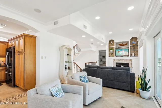 a kitchen with stainless steel appliances granite countertop a stove and a refrigerator