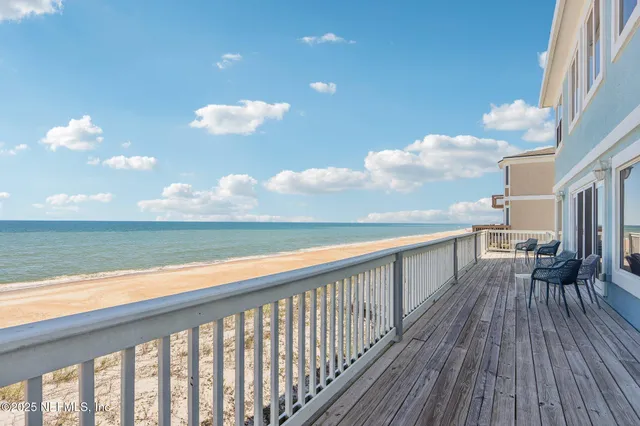 a front view of a house with parking space