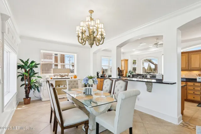 a kitchen with granite countertop cabinets stainless steel appliances and wooden floor