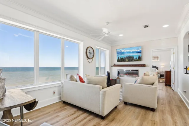 a bedroom with a bed and ceiling fan