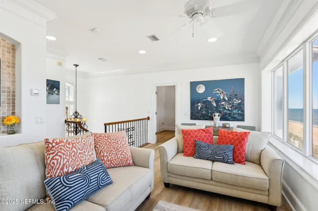 a spacious bathroom with a double vanity sink a mirror a bathtub and