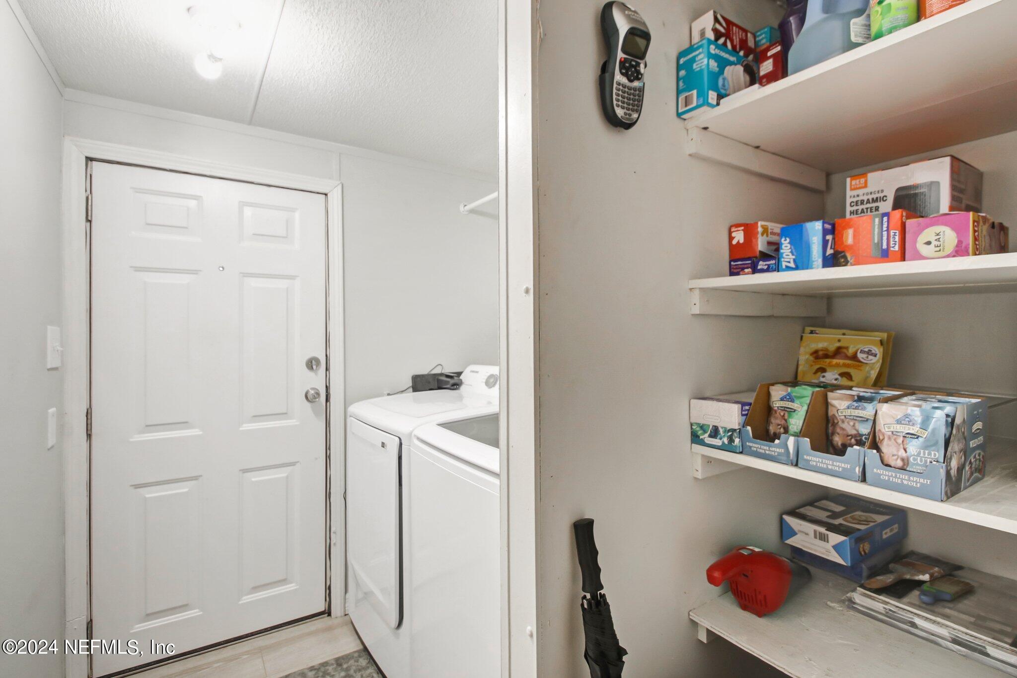 3996 Pinto Road Middleburg, FL 32068 - Photo 16 of 26 a room with storage and utility