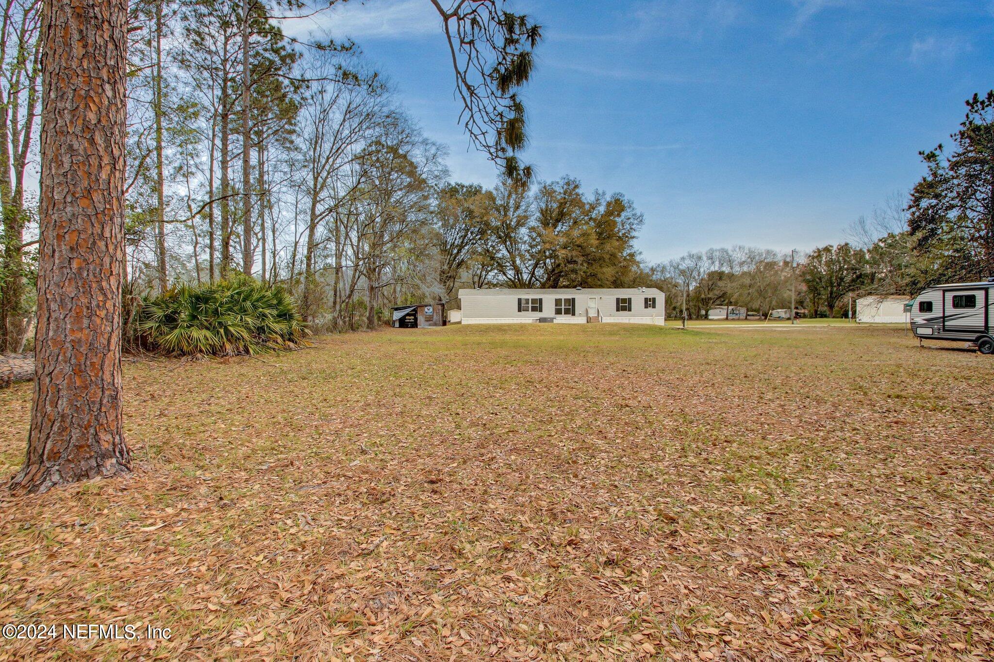 3996 Pinto Road Middleburg, FL 32068 - Photo 25 of 26 a view of an ocean and a yard