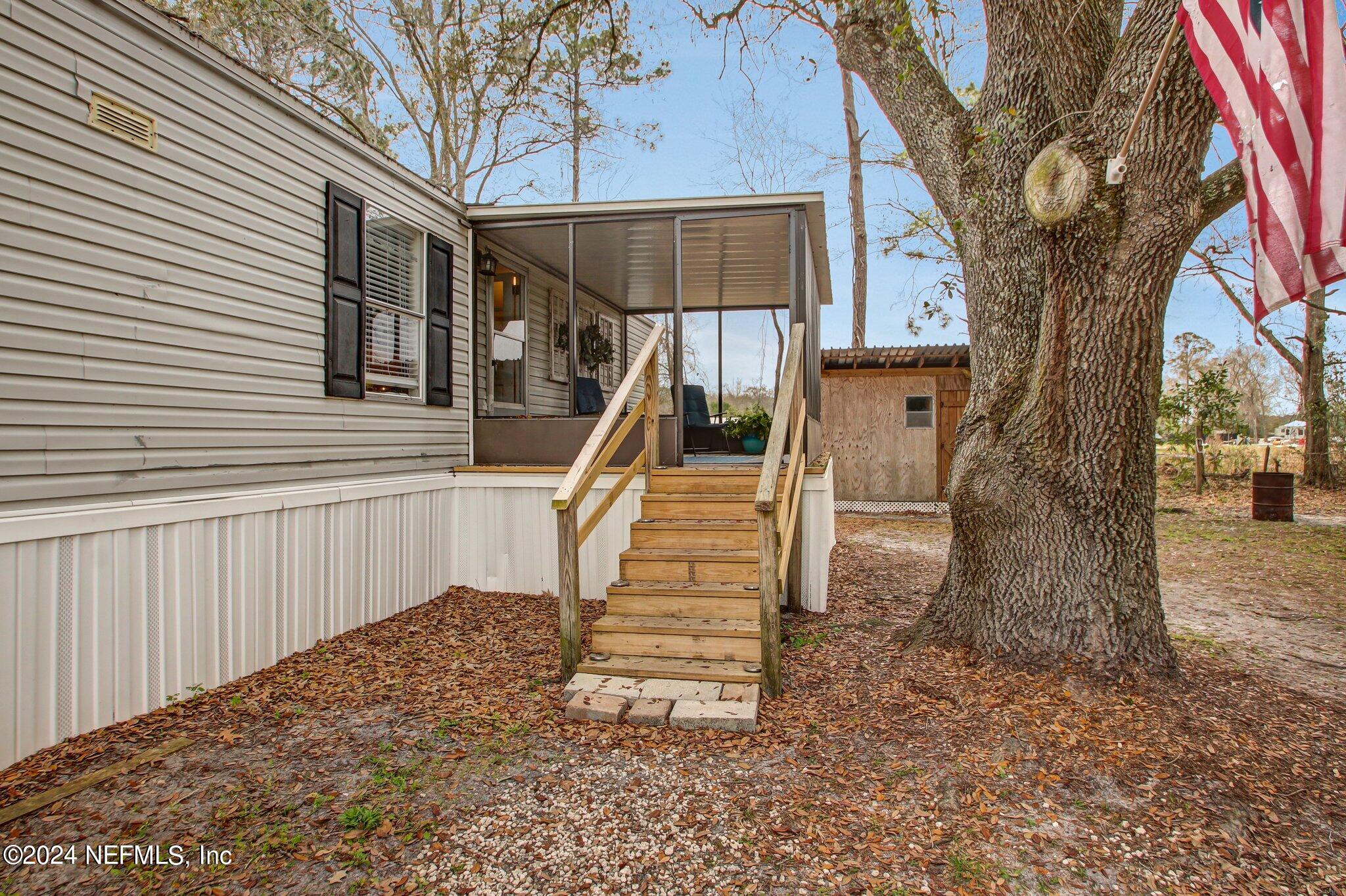 3996 Pinto Road Middleburg, FL 32068 - Photo 5 of 26 a view of a house with a park