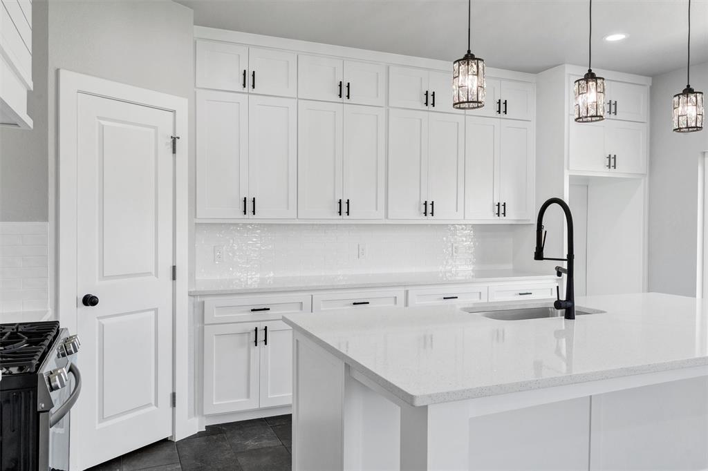 576 Highview Court Godley, TX 76044 - Photo 16 of 40 a view of a kitchen with a sink