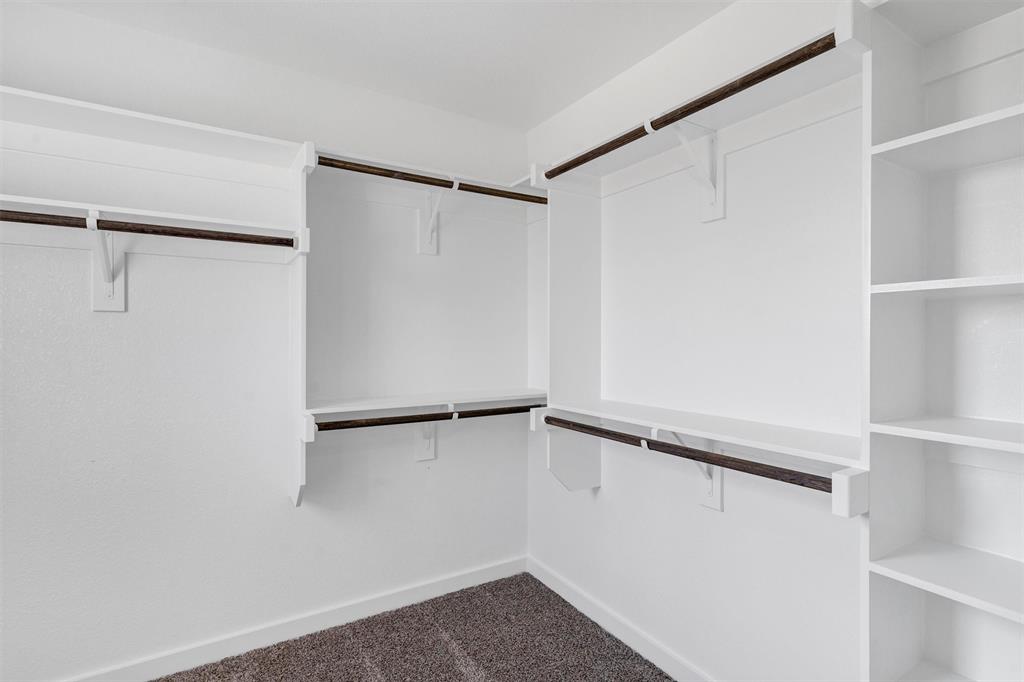 576 Highview Court Godley, TX 76044 - Photo 25 of 40 a view of an empty walk in closet