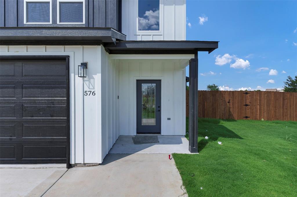 576 Highview Court Godley, TX 76044 - Photo 3 of 40 a view of a house with a yard