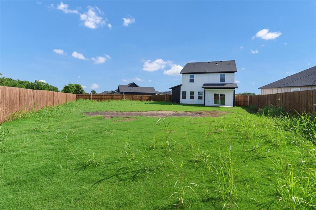 576 Highview Court Godley, TX 76044 - Photo 38 of 40 a house view with a garden space