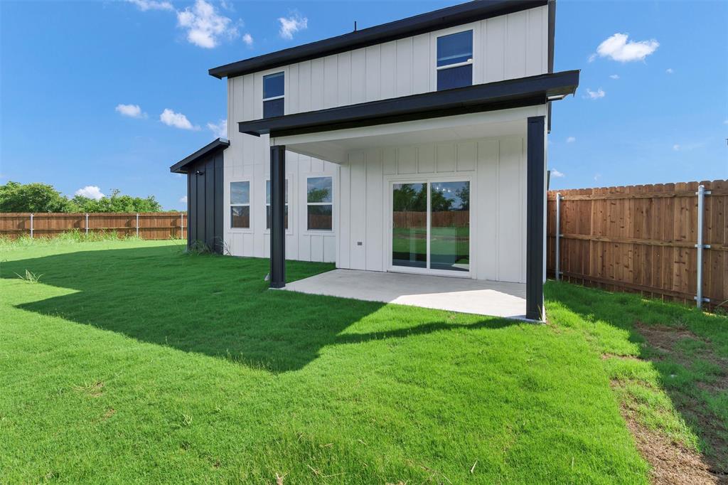 576 Highview Court Godley, TX 76044 - Photo 39 of 40 a view of an house with backyard porch and entertaining space