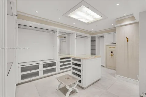 a room with furniture and white walls